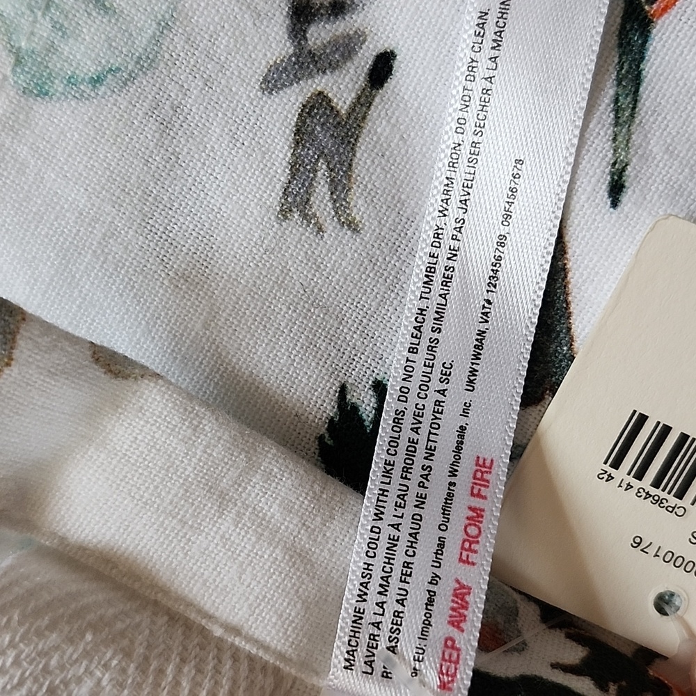Anthropologie White and Multicolor Patterned Napkins Set Of 7 - Picture 9 of 10
